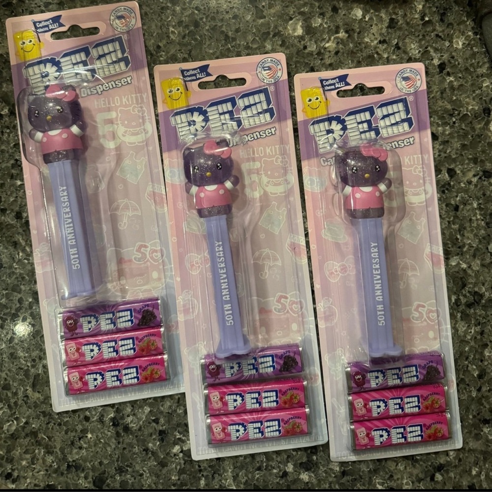 Pez Glitter Hello Kitty 50th Anniversary carded dispensers Price is firm🙏